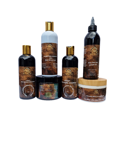The wash day routine includes clarifying shampoos and Bentonite clay. MERE&
